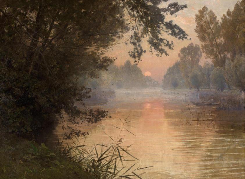 Serene river scene at sunset with calm water reflecting soft pink and orange hues. Overhanging trees frame the tranquil, atmospheric landscape.