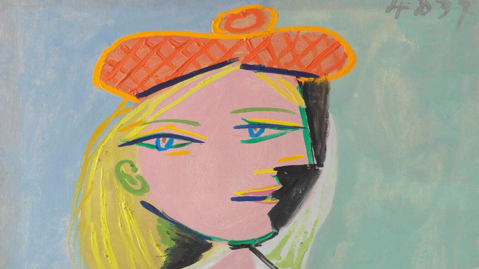 Abstract painting of a face with an orange hat on a light blue background