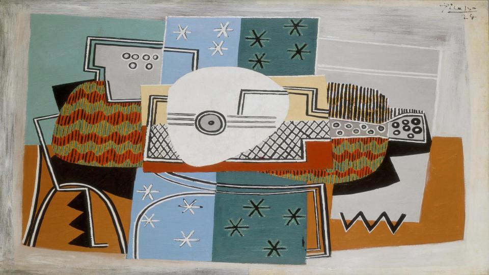 Abstract artwork with geometric shapes and patterns on a textured surface