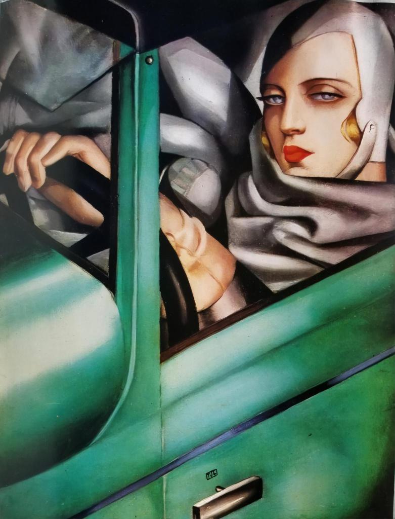 Art Deco painting of a woman driving a green car. She wears a gray headscarf and red lipstick, exuding elegance and confidence.