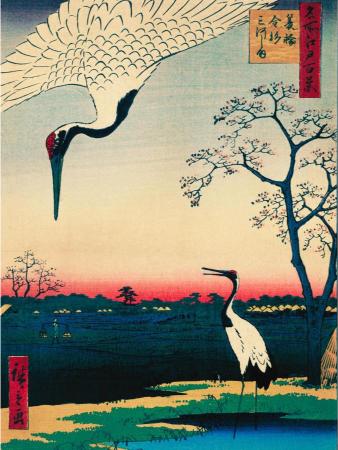 Japanese woodblock print of two cranes in a serene lakeside scene at sunset. The sky is a gradient from red to blue, with bare trees silhouetted.