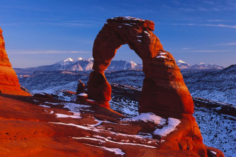 Various Photographers - Delicate Arch Under Milennium Sunset