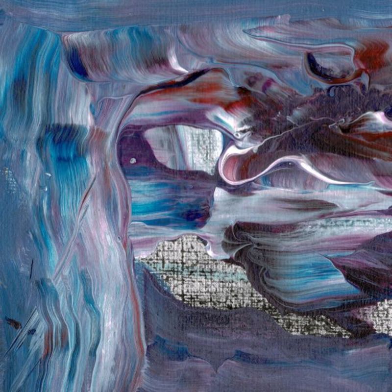 This image presents a close-up view of an abstract painting, emphasizing its intricate and vibrant details. The artwork features a blend of blues and purples, with swirls and drips that create a sense of movement and texture.