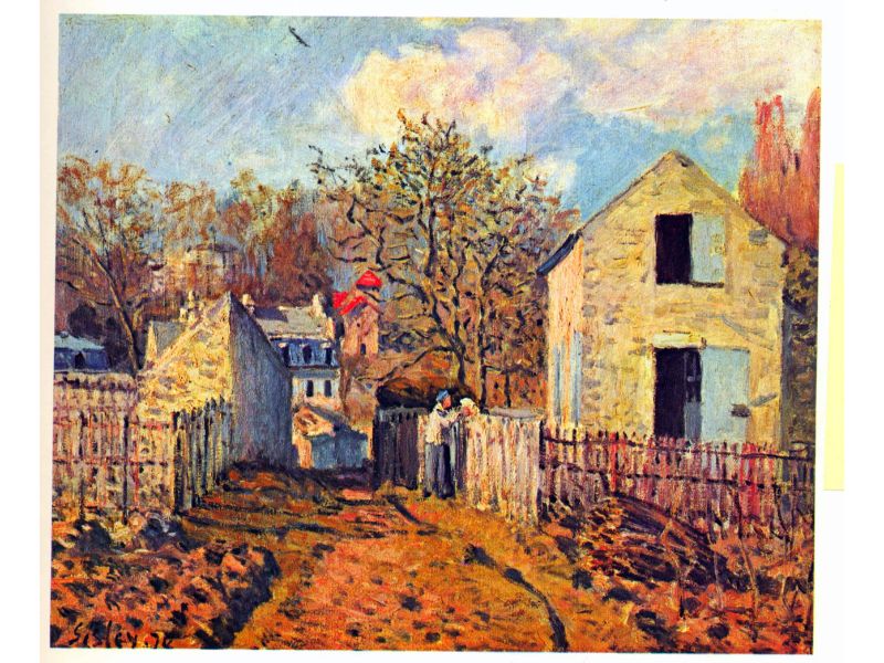 A framed artwork depicting a village scene with buildings, trees, and a pathway, primarily in shades of blue, brown, and yellow.